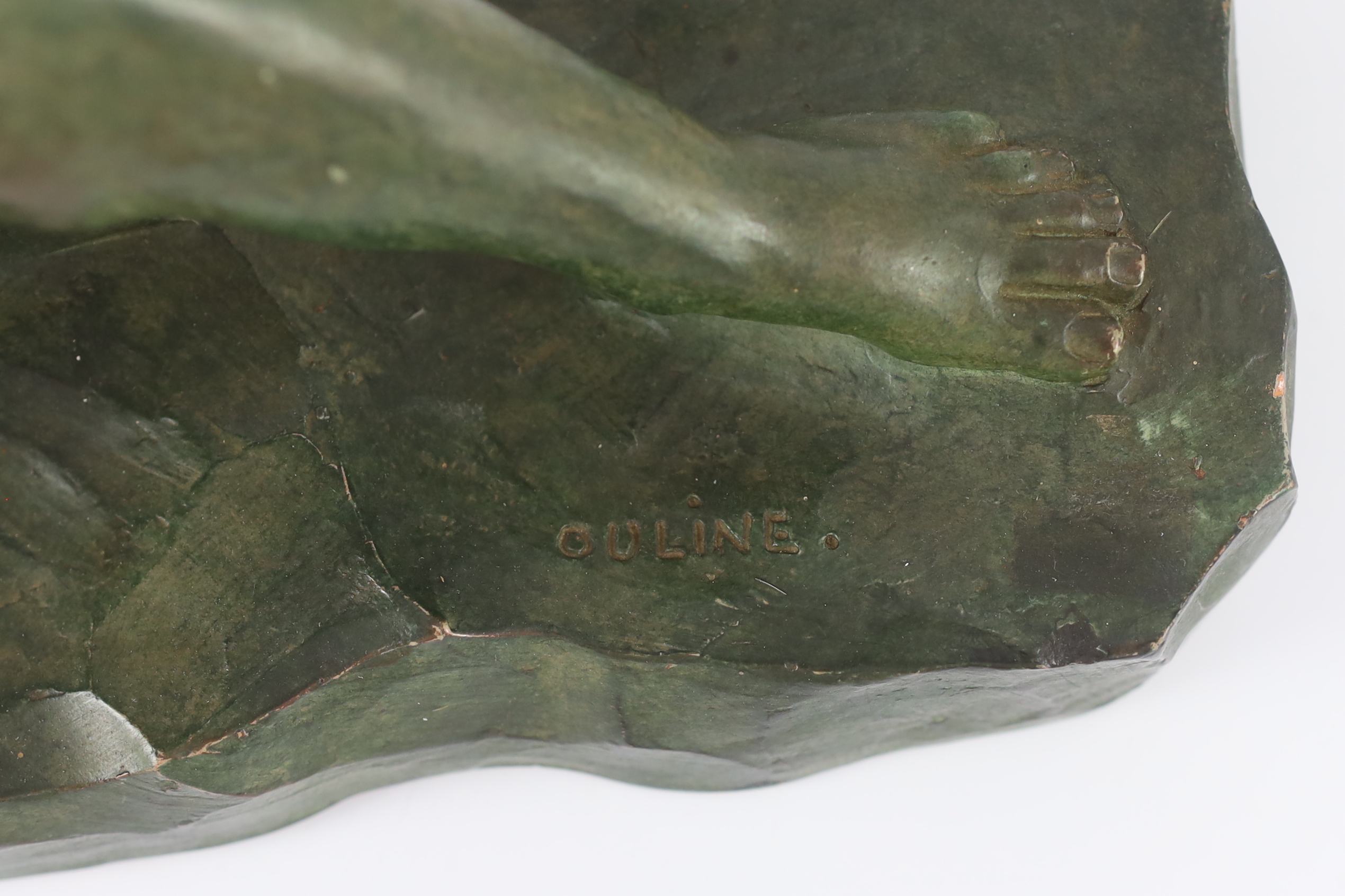 Alexandre Ouline (French, fl.1918-1940). An Art Deco bronzed terracotta sculpture, signed, 50cm wide, 15cm deep, 35cm high